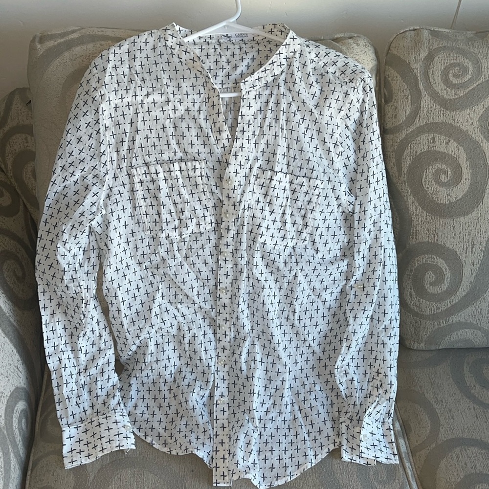 Carve designs unique blouse. Beautiful pattern.